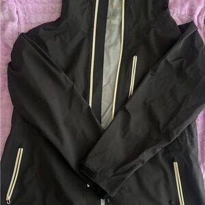 Uniqlo Men's Black coat with White Accents